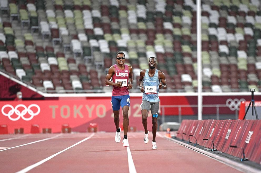 PHOTO: Isaiah Jewett, of the United States, and Nijel Amos, right, of Botswana, finish the race after falling in the men's 800-meter semifinal at the 2020 Summer Olympics, Aug. 1, 2021, in Tokyo. 