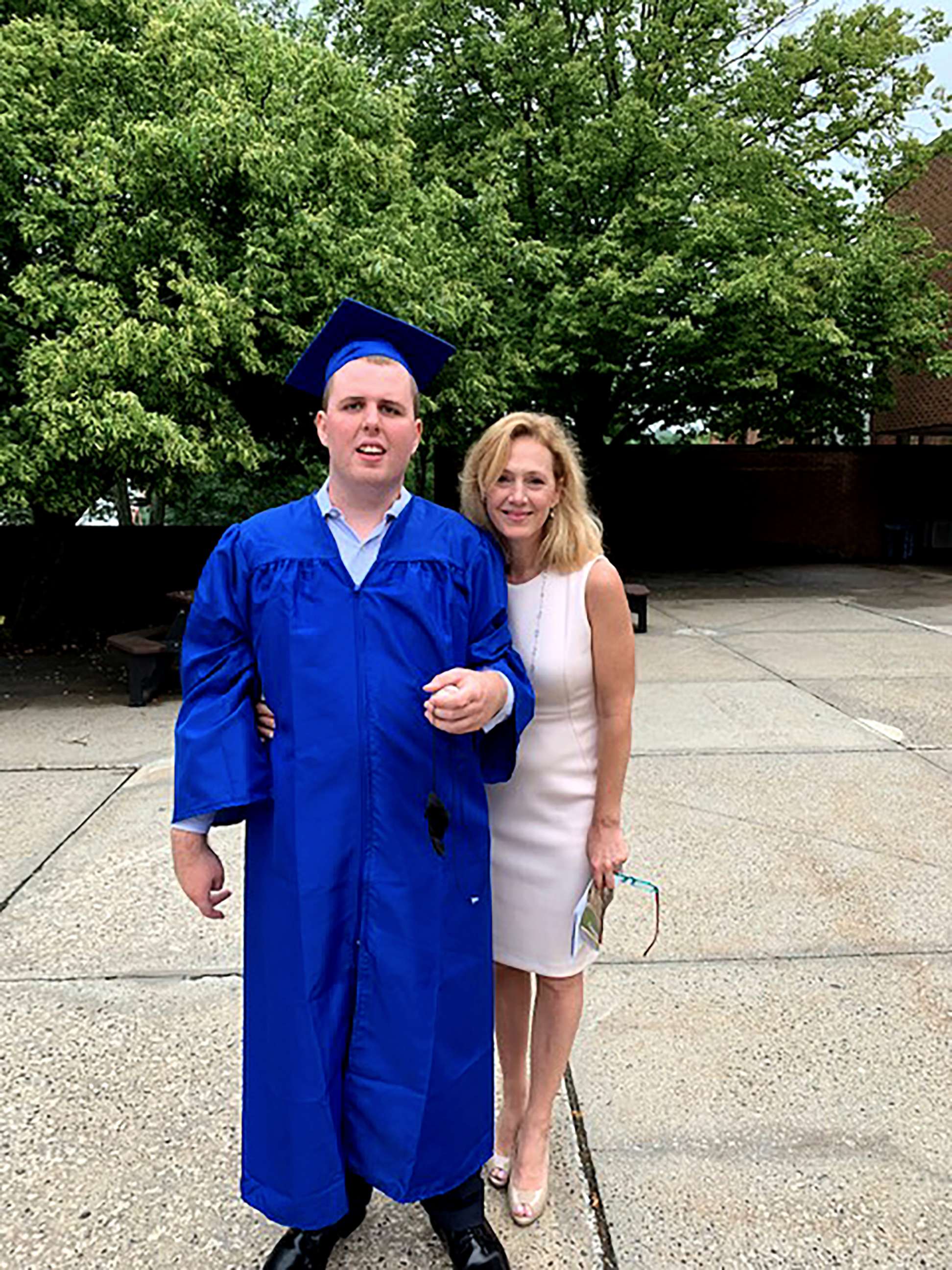 PHOTO: Jack Higgins and his mom Barbara Higgins pose at his graduation ceremony.