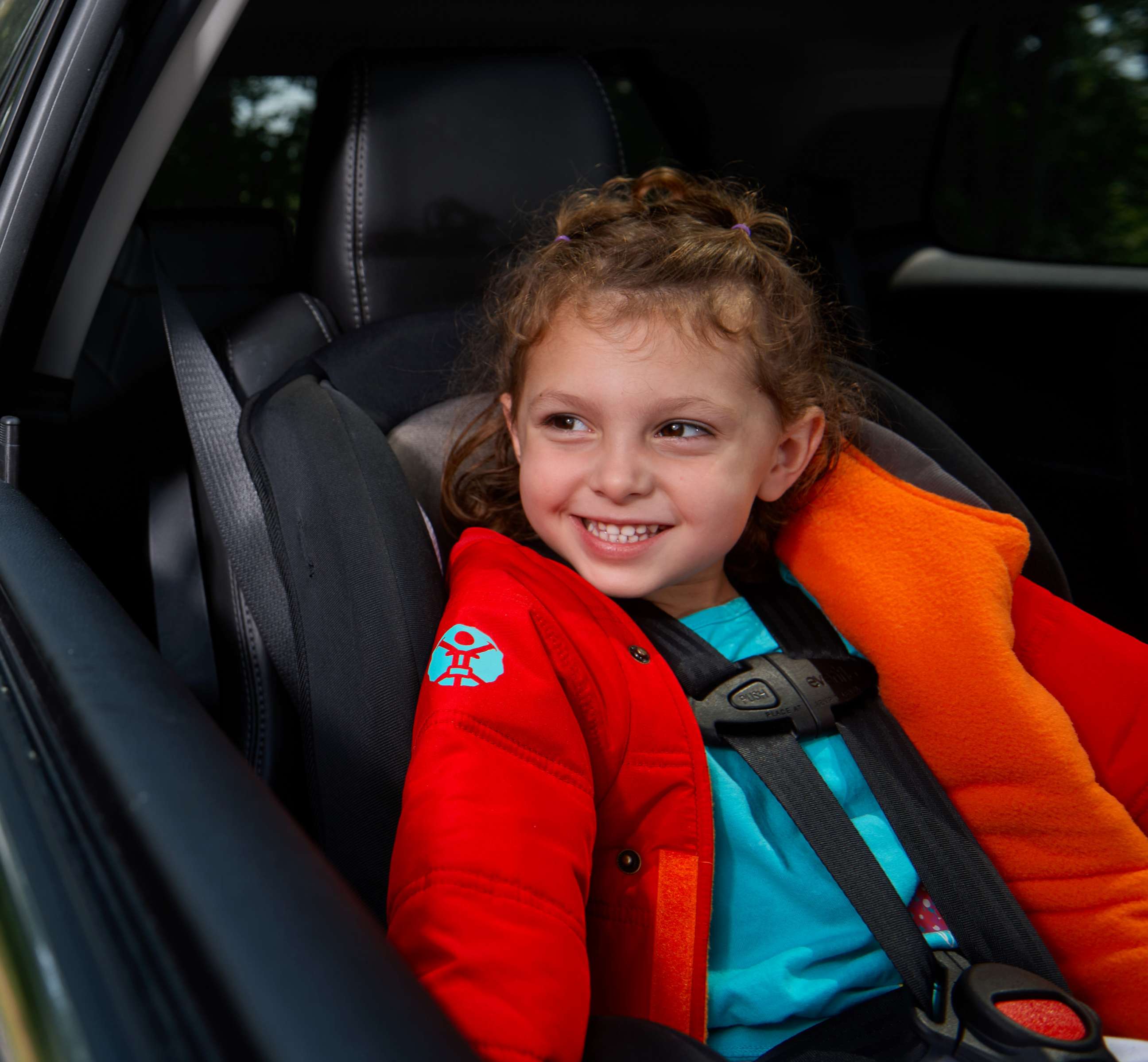 PHOTO: A Buckle Me Baby Coats coat opens so the car seat harness is not blocked by fabric.