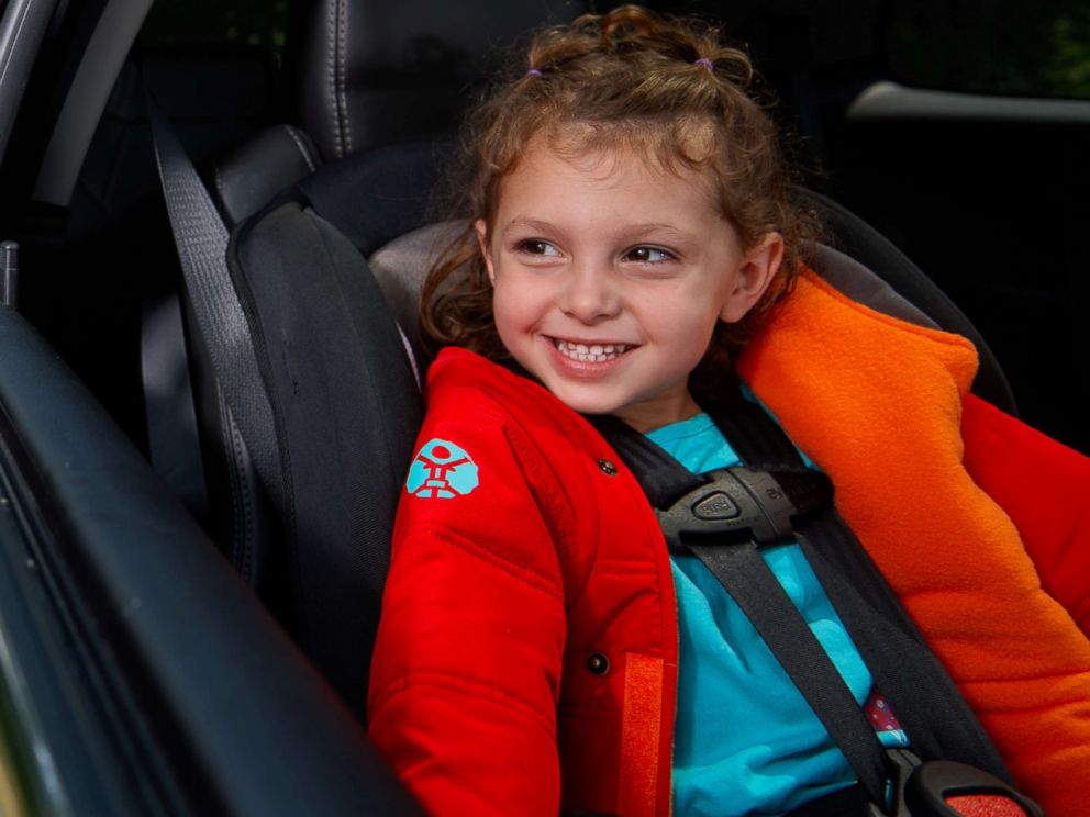PHOTO: A Buckle Me Baby Coats coat opens so the car seat harness is not blocked by fabric.