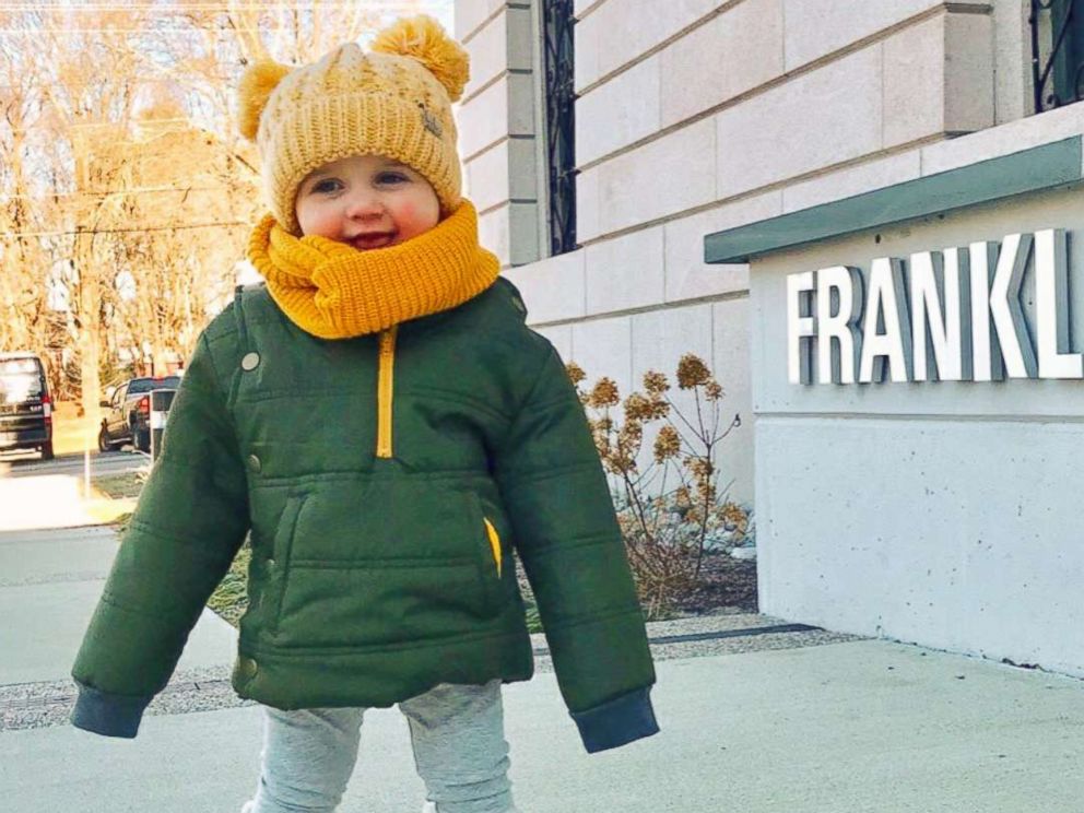 PHOTO: A child poses in a coat by Buckle Me Baby Coats.