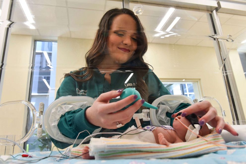PHOTO: Jade England is following in her mother's footsteps as a NICU nurse. England just began her new job as a nurse at the UAB Women and Infants Center's Regional Neonatal Intensive Care Unit.