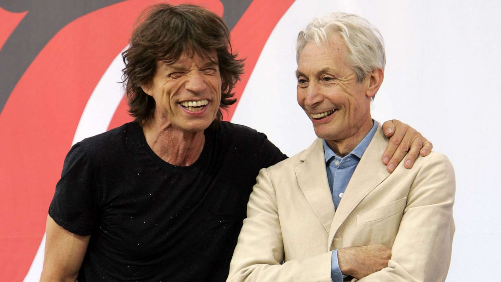 PHOTO: Mick Jagger, left, and Charlie Watts of The Rolling Stones talk to reporters during a press conference to announce a world tour at the Julliard Music School May 10, 2005, in New York City.