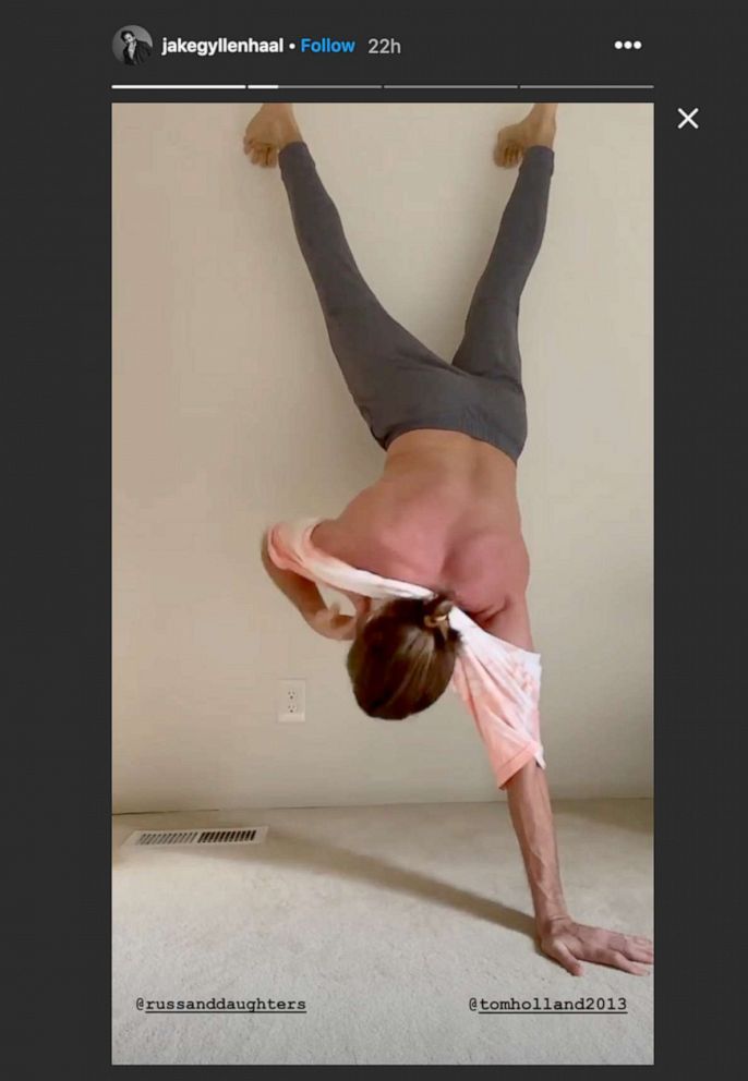 PHOTO: Jake Gyllenhaal takes part in the handstand challenge on Instagram.