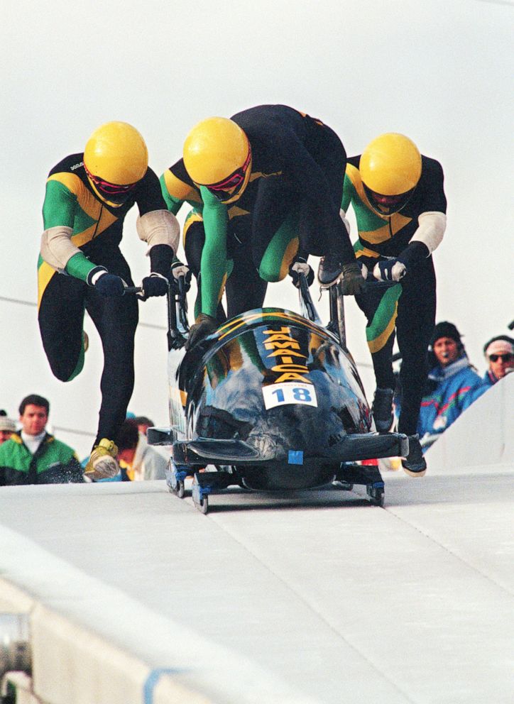 PHOTO: Jamaican four-man bobsleigh pilot Dudley Stokes jumps in as his three teammates push off at the start of the second run of the Olympic four-man bobsleigh event on Feb. 27, 1988, at the Canada Olympic Park in Calgary.