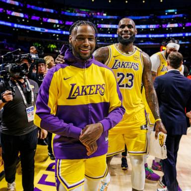 PHOTO: Los Angeles Lakers guard Bronny James (9) and Los Angeles Lakers forward LeBron James (23) leaves the court after a win over the Minnesota Timberwolves in the home opener, Oct. 22, 2024, in Los Angeles.