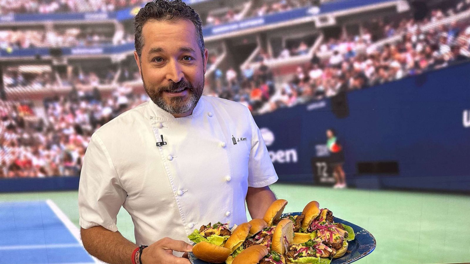 PHOTO: Crown Shy executive chef James Kent prepares his sandwich being served at the U.S. Open.