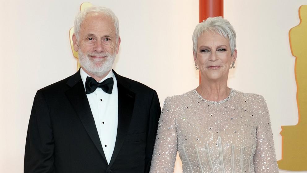 PHOTO: Christopher Guest and Jamie Lee Curtis attend the 95th Annual Academy Awards, March 12, 2023, in Hollywood, Calif.