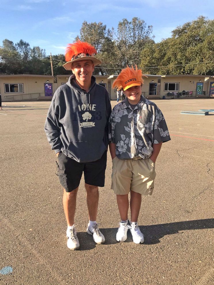 PHOTO: Huss with one of his students, Aubrey, who dressed up like him for Halloween. 