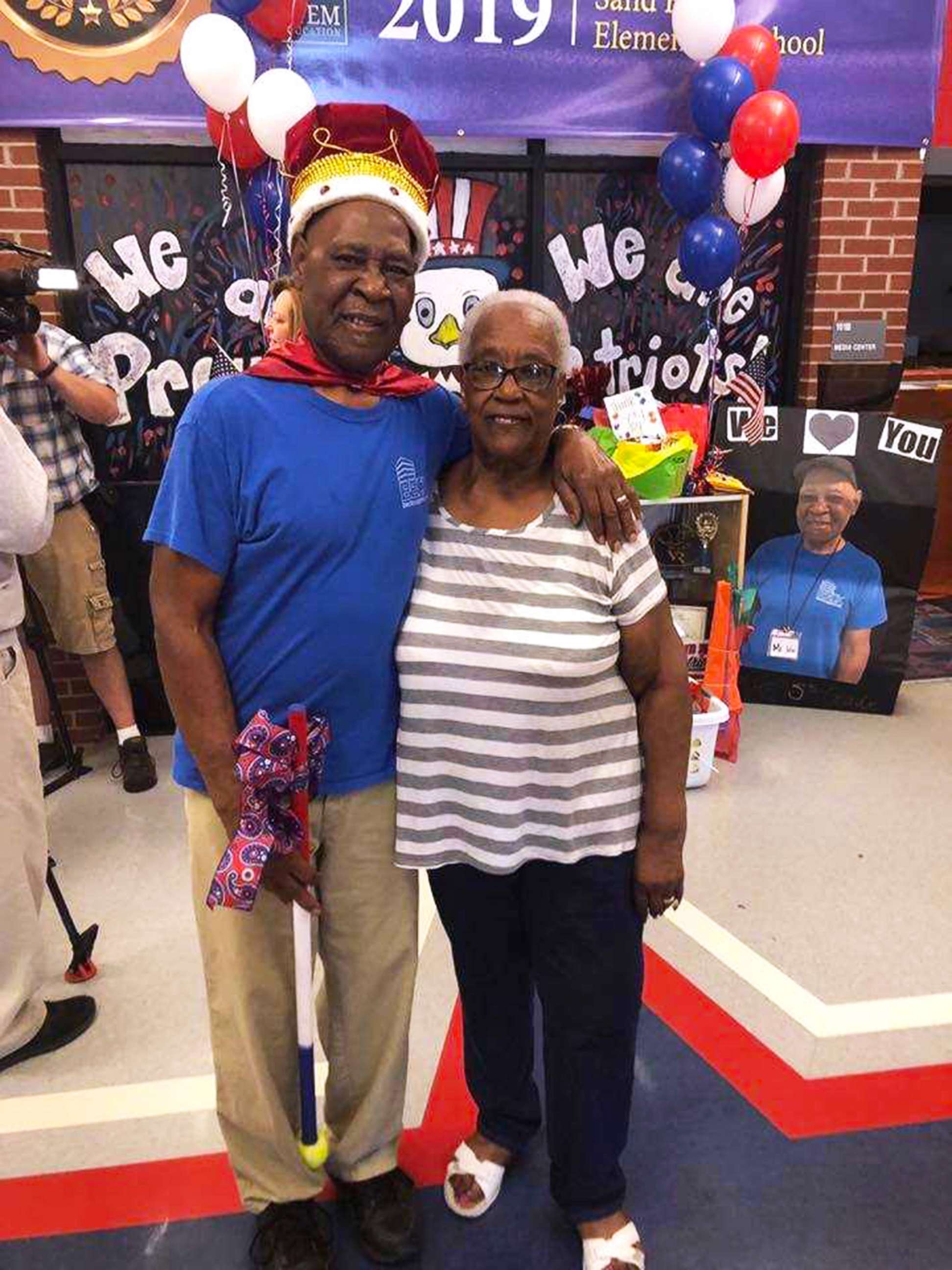 PHOTO: John Lockett, 83, a janitor at Sand Hill Elementary School in Carrollton, GA, is photographed on May 17, 2019, with his wife of 25 years, Annie Lockett.