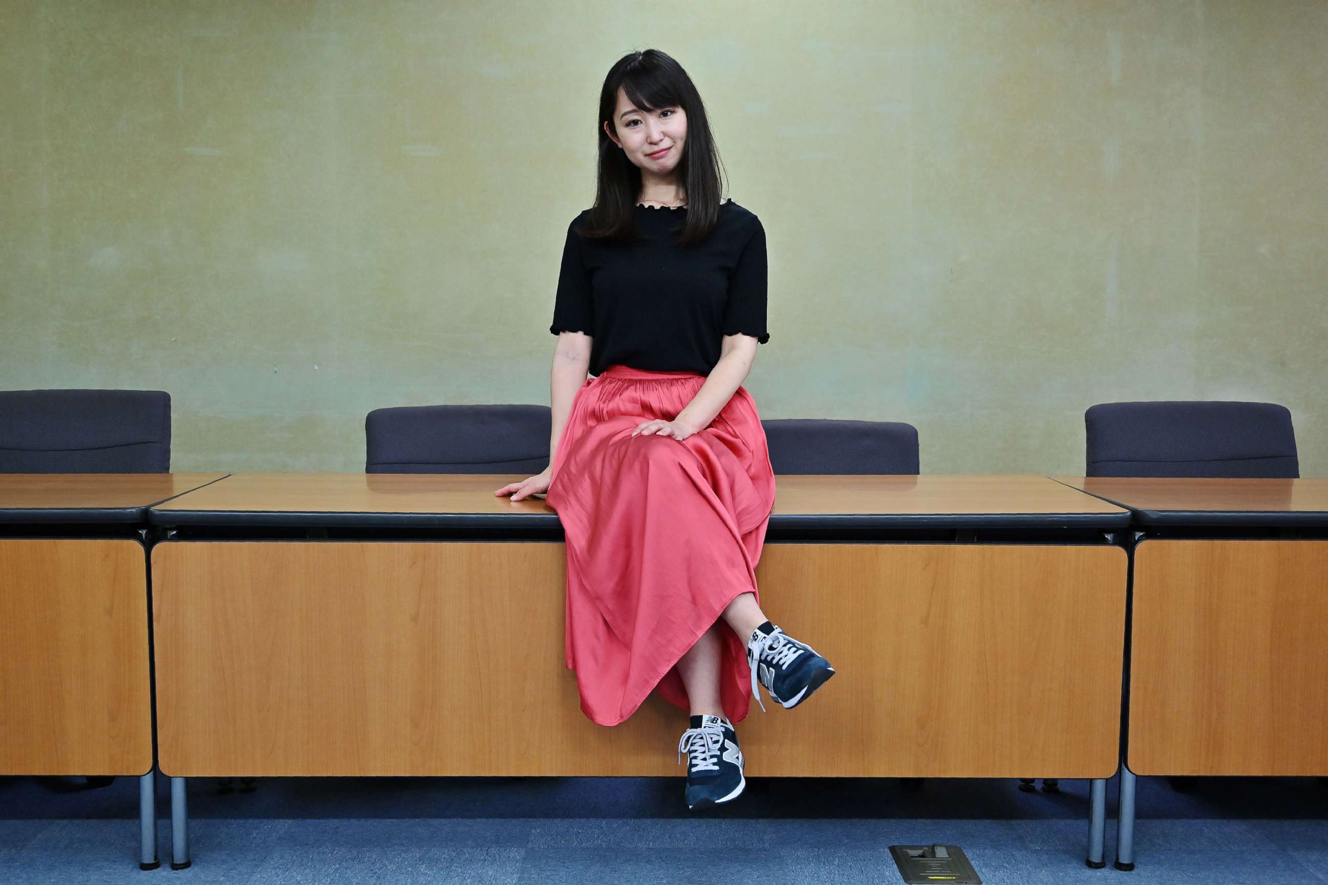 PHOTO: Yumi Ishikawa, leader and founder of the KuToo movement, poses after a press conference in Tokyo on June 3, 2019. 