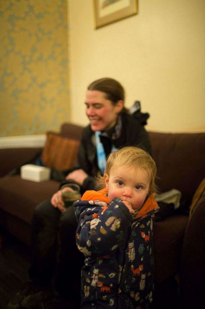 PHOTO: Jasmin Paris sits with her 14-month-old daughter, Rowan.