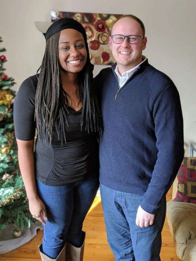 PHOTO:  Jasmin Ford, 30, poses in her Chicago home with Mike Crawford of Fifth Third Bank.