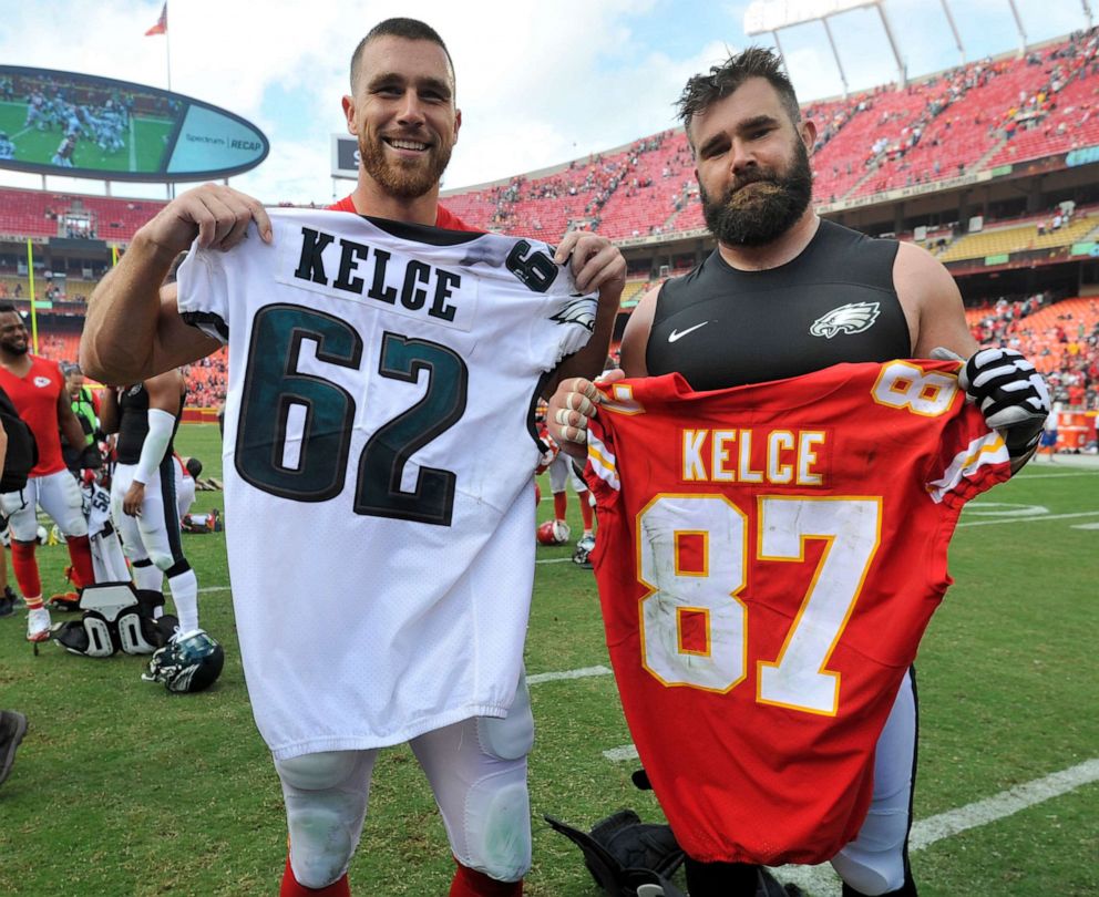 PHOTO: In this Sept. 17, 2017, file photo, Kansas City Chiefs tight end Travis Kelce, left, and his brother, Philadelphia Eagles center Jason Kelce (62), exchange jerseys following an NFL football game in Kansas City, Mo.