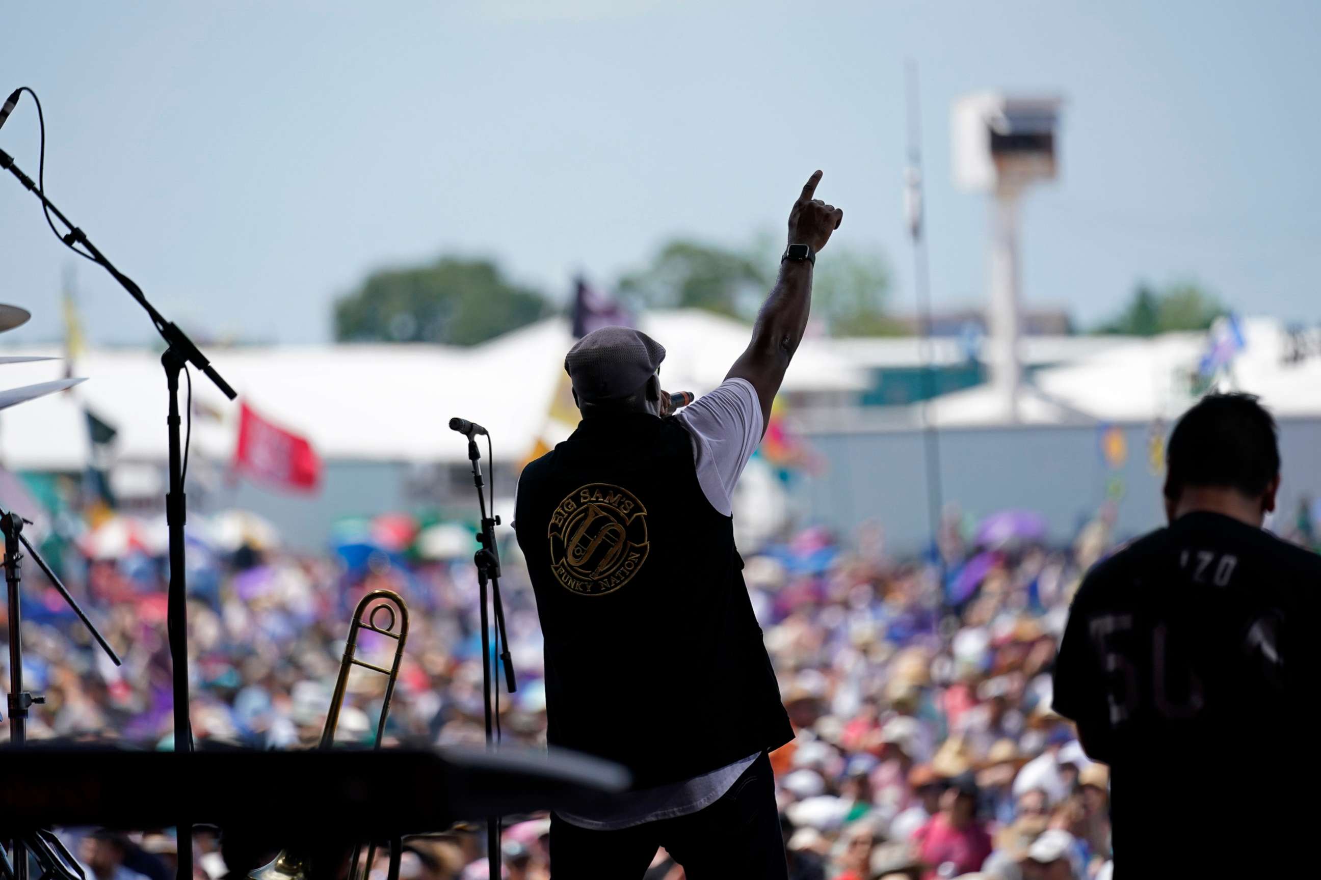 PHOTO: Big Sam's Funky Nation performs at the New Orleans Jazz & Heritage Festival in New Orleans, April 29, 2022. 