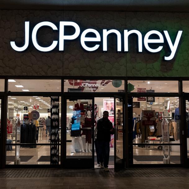 Customers walk out of a JCPenney department store at Fashion Valley shopping mall, Dec. 13, 2024 in San Diego, Calif.