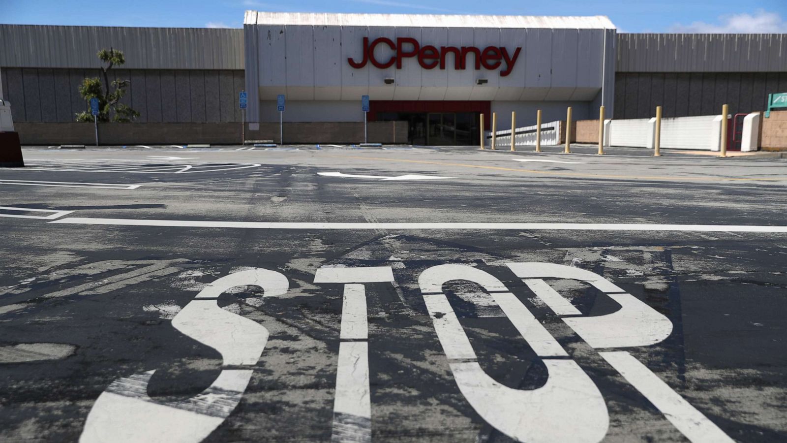 Woman Waling With Jcpenney And Victorias Secret Shopping Bag In