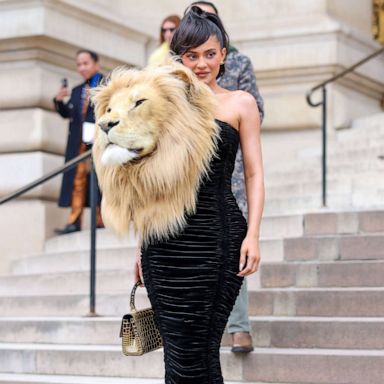 Kylie Jenner wears giant lion head during Paris Fashion Week