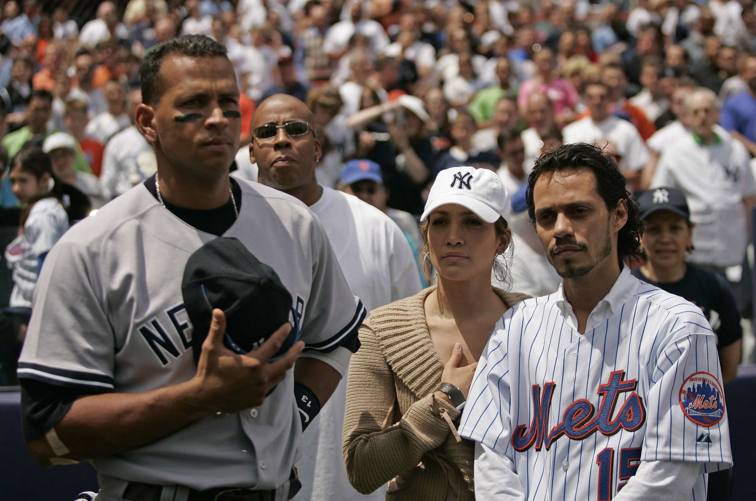 PHOTO: Actress Jennifer Lopez and husband Marc Anthony stand with New York Yankee Alex Rodriguez before a game at Shea Stadium in Queens, New York on Saturday May 21, 2005.