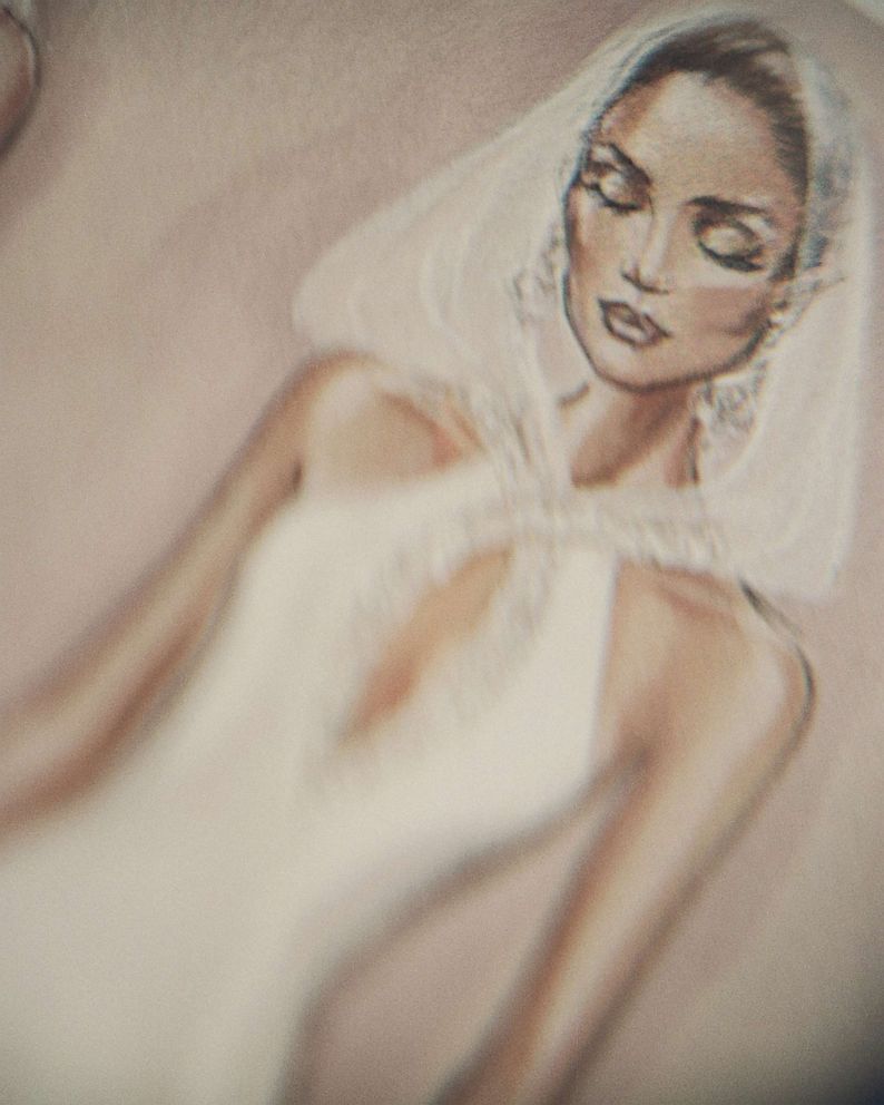 PHOTO: Sketch of one of Jennifer Lopez's wedding dresses featuring a keyhole neckline embellished with Swarovski crystals.