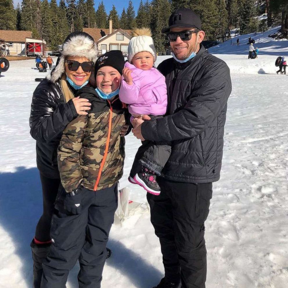 PHOTO: Ryan and Jennifer Nash pose with their two oldest children.