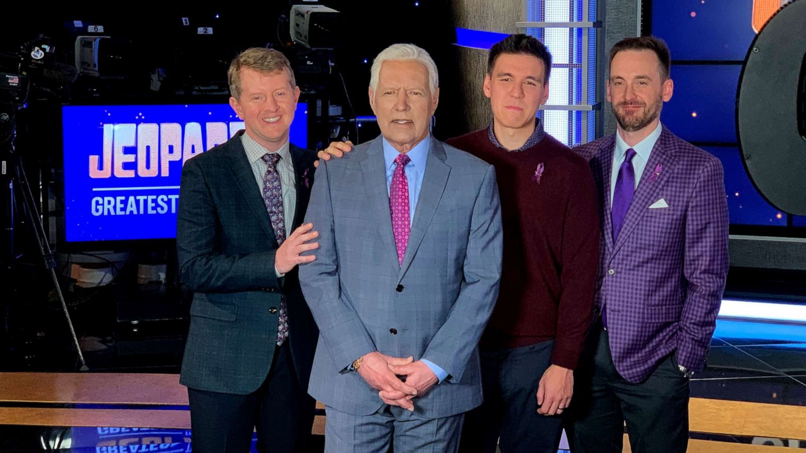 PHOTO: Ken Jennings, Brad Rutter and James Holzhauer pose with Alex Trebek on the set of "Jeopardy! The Greatest of All Time."