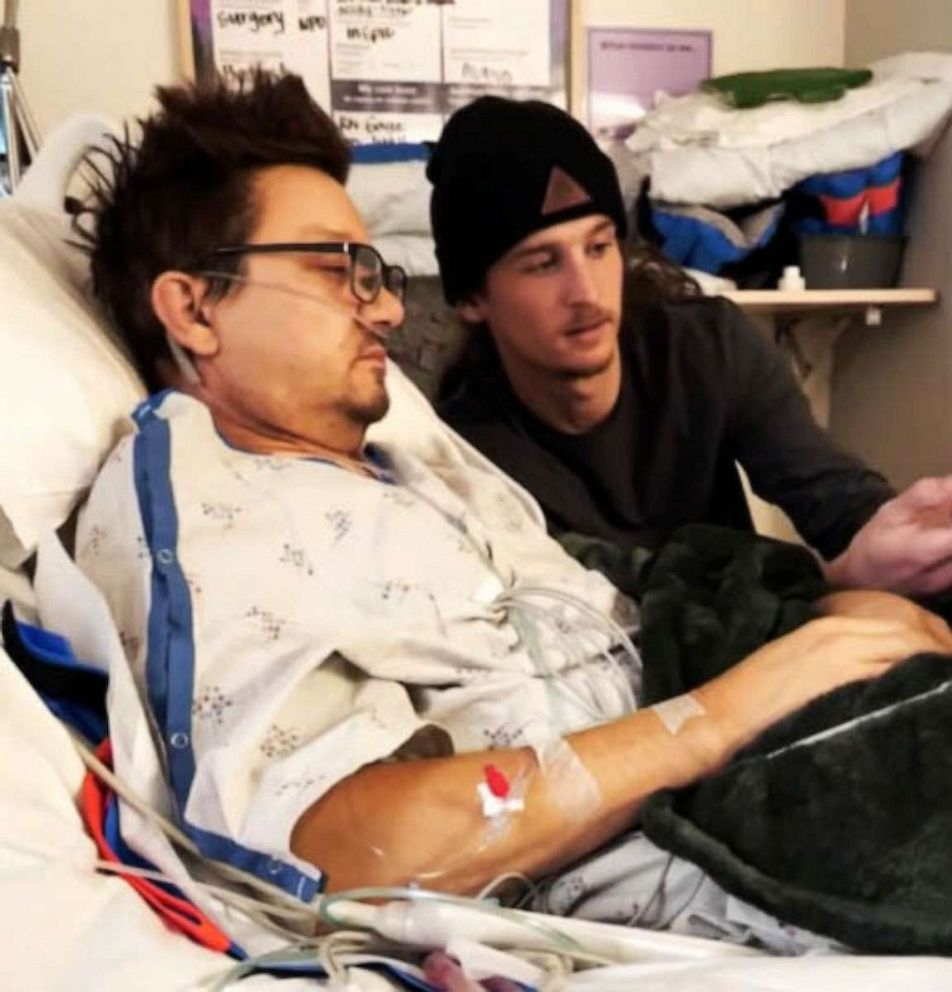 PHOTO: Jeremy Renner lays in hospital bed as his nephew, Alex Fries, sits by Renner's bedside in this undated photograph taken from a Reno, Nevada, hospital following Renner's accident.