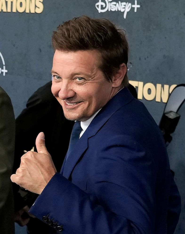 PHOTO: Jeremy Renner, the host and executive producer of "Rennervations," gives a thumbs-up to photographers at the premiere of the four-part Disney+ docuseries, April 11, 2023 in Los Angeles.