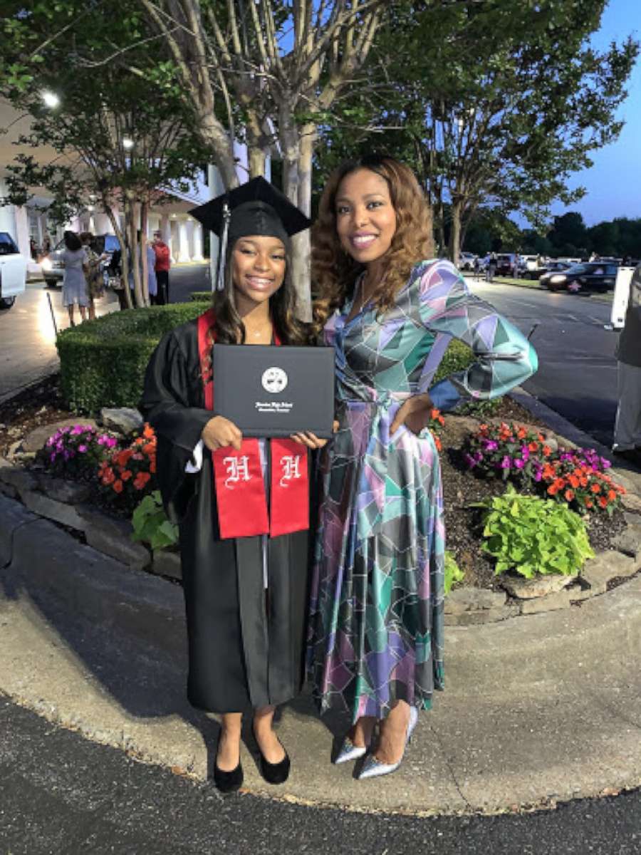 PHOTO: Jerica Phillips poses with her daughter Jaidah at Jaidah's high school graduation in May 2021.