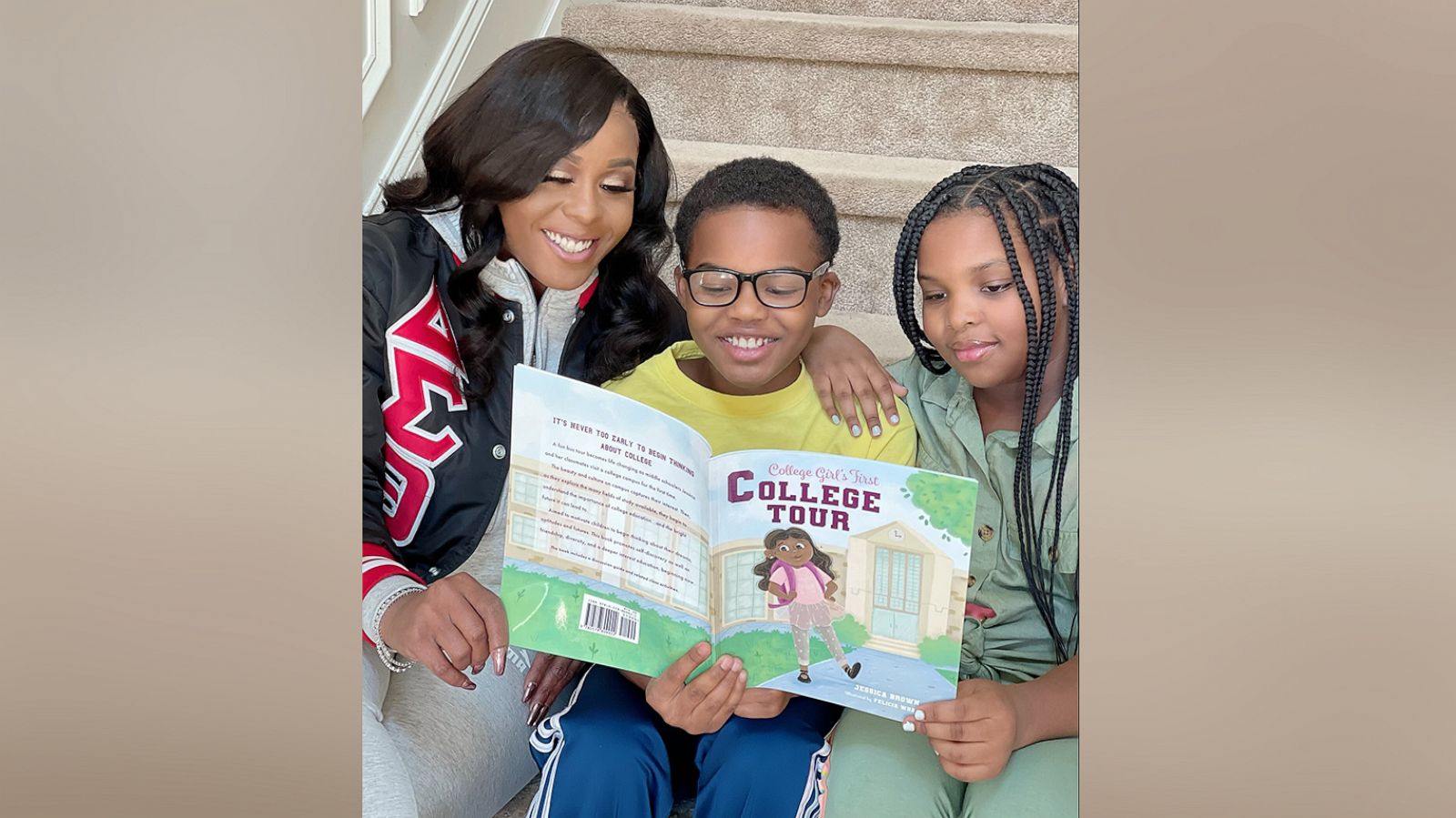 PHOTO: Jessica Brown reads her book College Girl's First College Tour to children.