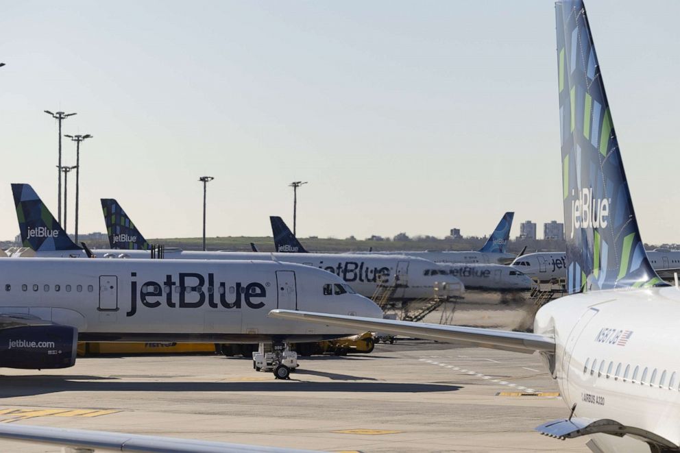 PHOTO: JetBlue planes sit at John F. Kennedy International Airport in New York, Nov. 24, 2021.