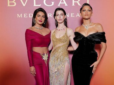 Anne Hathaway Wears Versace Dress With a Major Leg Slit to Met Gala 2023