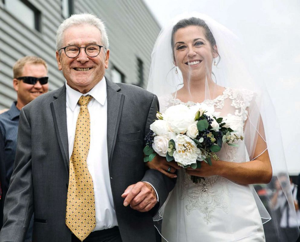 PHOTO: Jim Stamp, 70, accompanied Gina Ross down the aisle using his cane before surprising her by ditching it during their father-daughter dance.