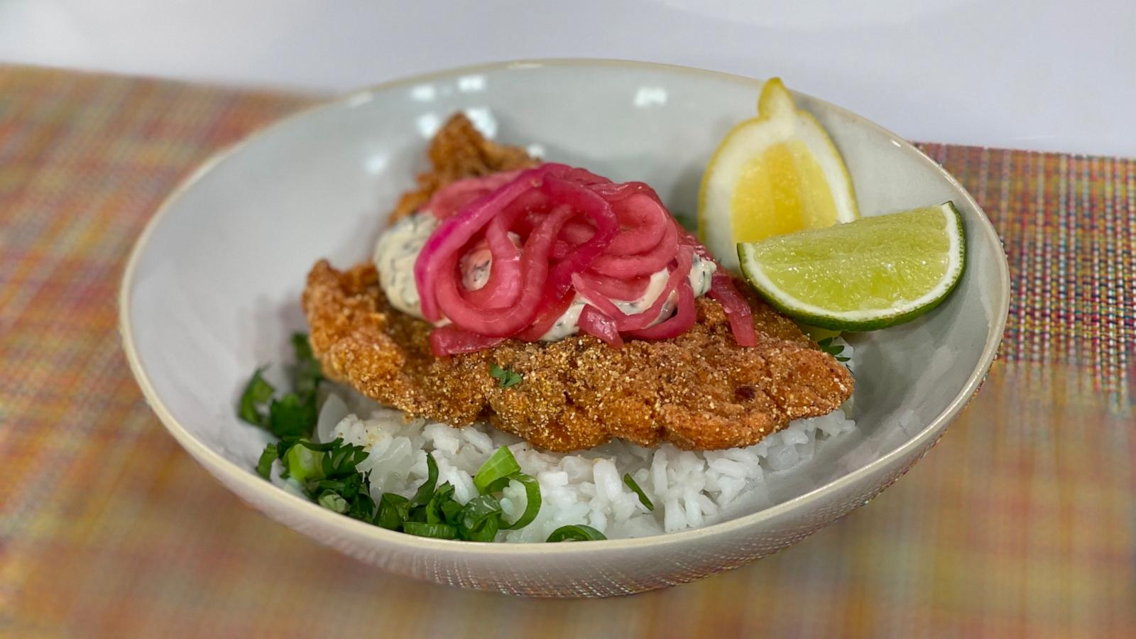 PHOTO: Chef JJ Johnson cooks up a crispy rice fish bowl that can be found at his new restaurant Fieldtrip in the Bahamas.