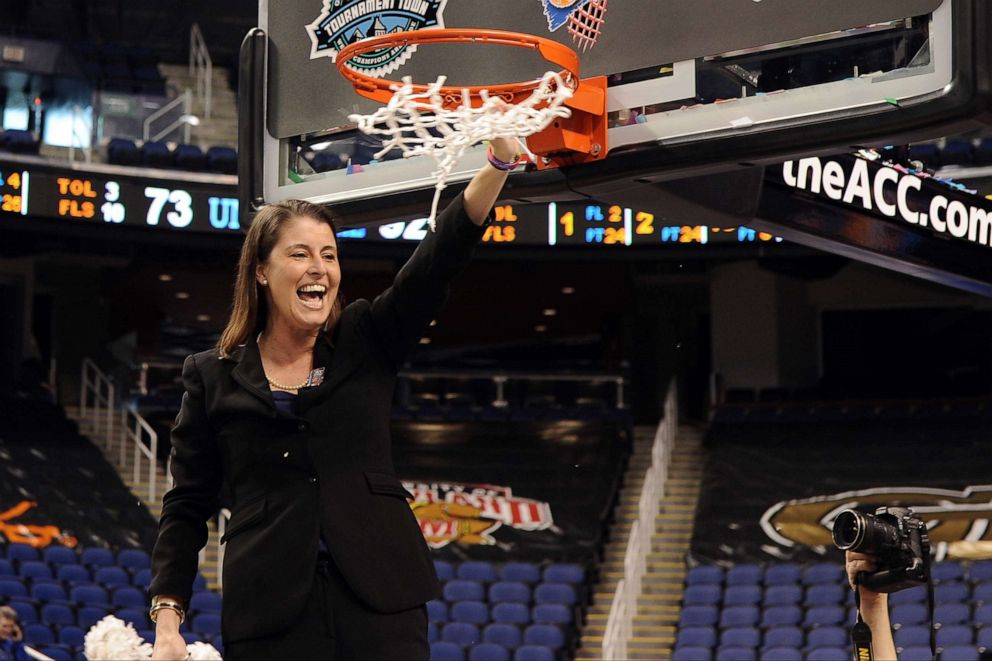 PHOTO: Head Coach Joanne P. McCallie of the Duke Blue Devils celebrates following their 92-73 victory against the North Carolina Tar Heels during the finals of the 2013 Women's ACC Tournament at the Greensboro Coliseum in Greensboro, N.C., March 10, 2013.