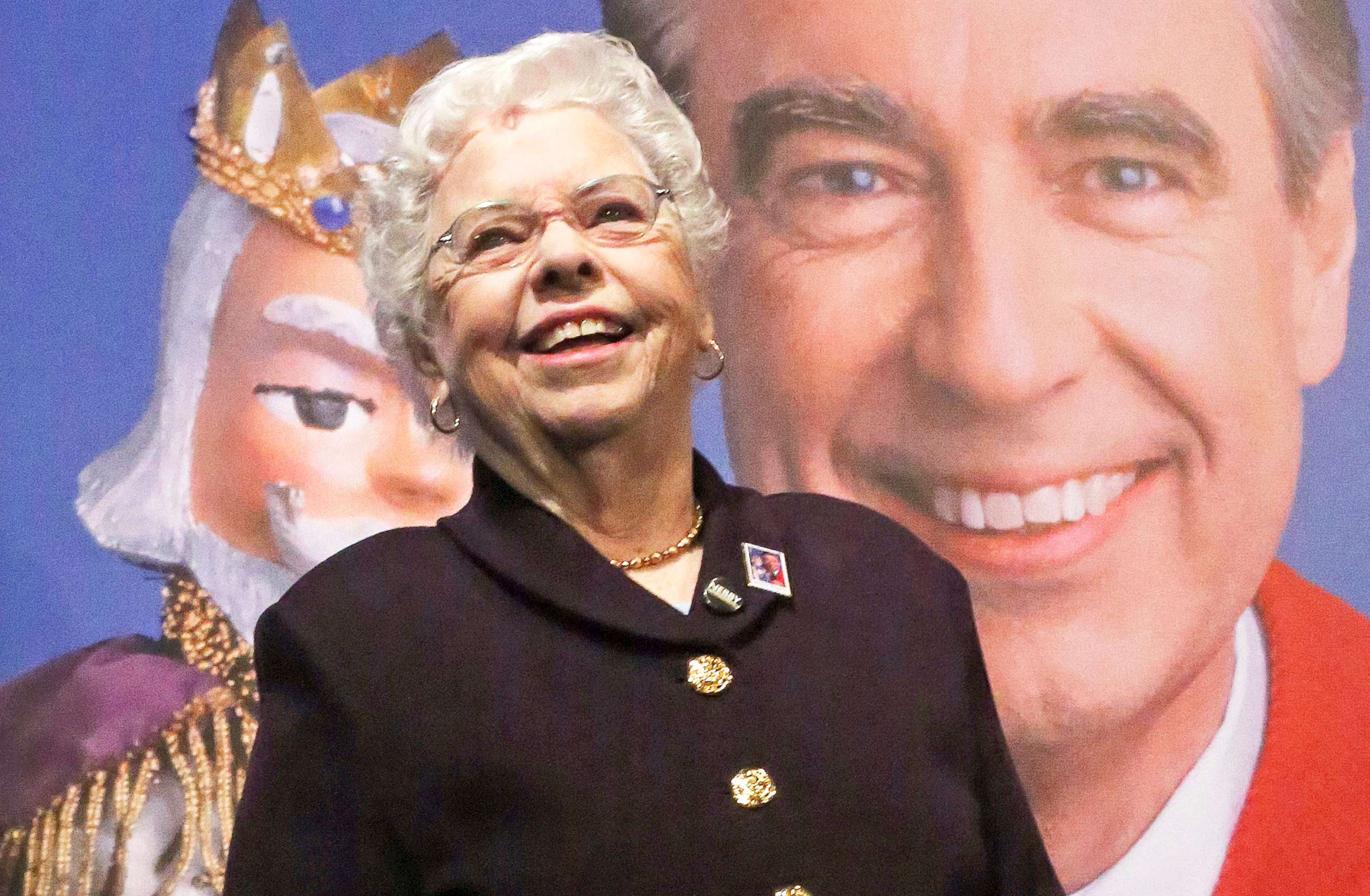 PHOTO: Joanne Rogers stands in front of a giant Mister Rogers Forever Stamp following the first-day-of-issue dedication in Pittsburgh on March 23, 2018.