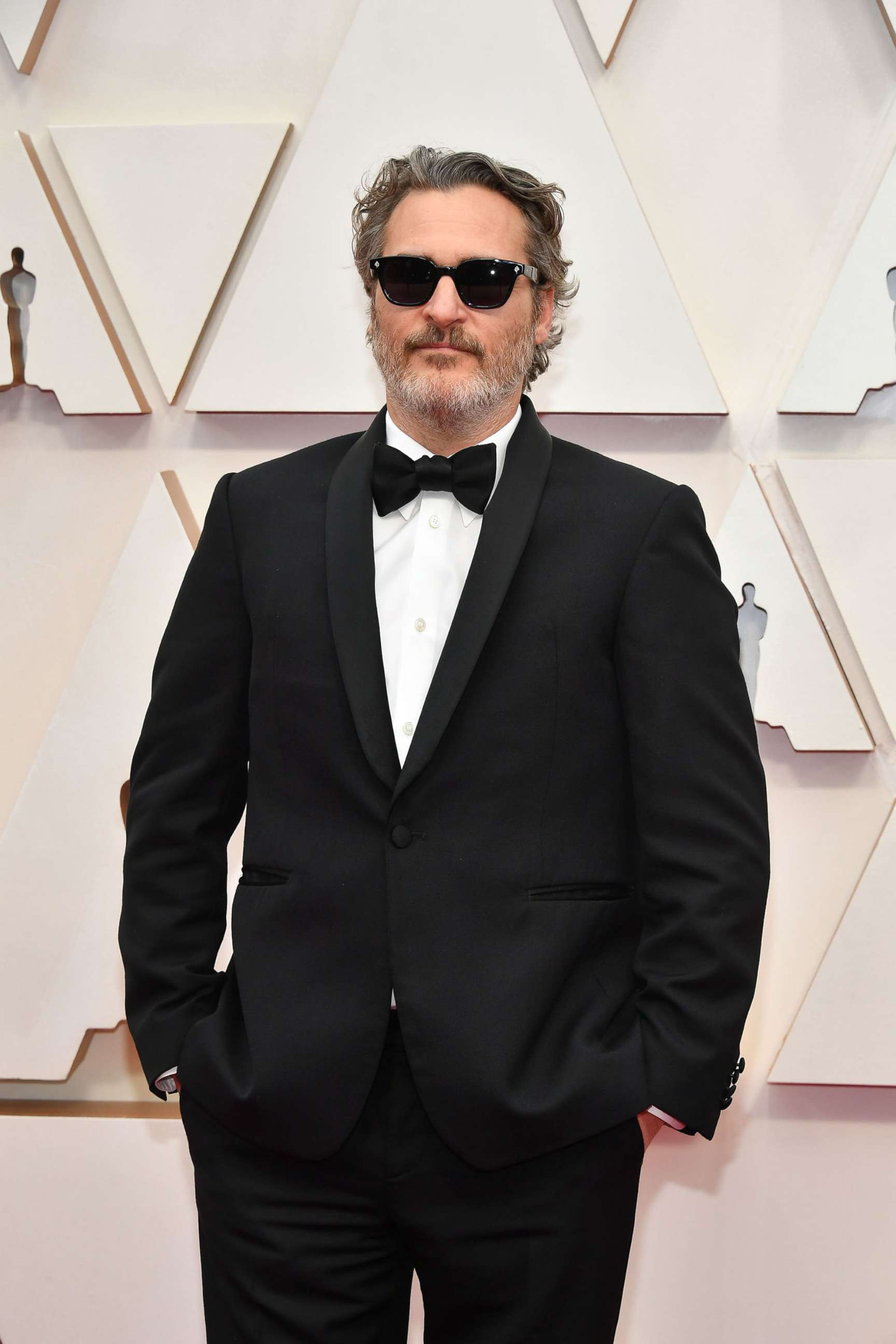 PHOTO: Joaquin Phoenix arrives at the Oscars, Feb. 9, 2020, in Hollywood, Calif. 
