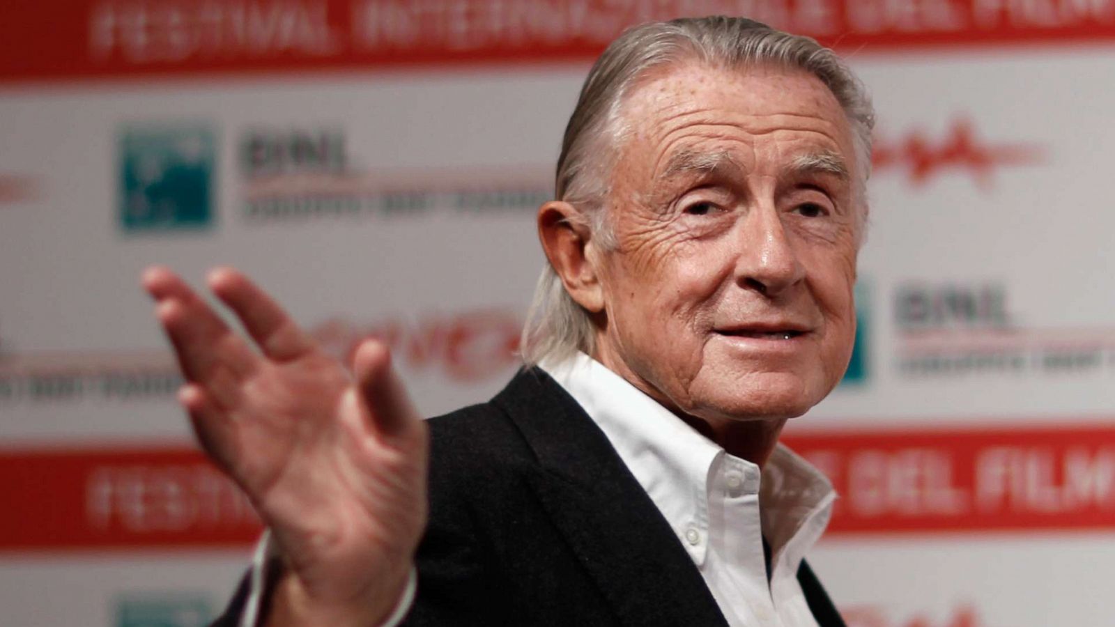 PHOTO: Director Joel Schumacher waves as he poses during a photo call at a film festival in Rome, Nov. 3, 2011.