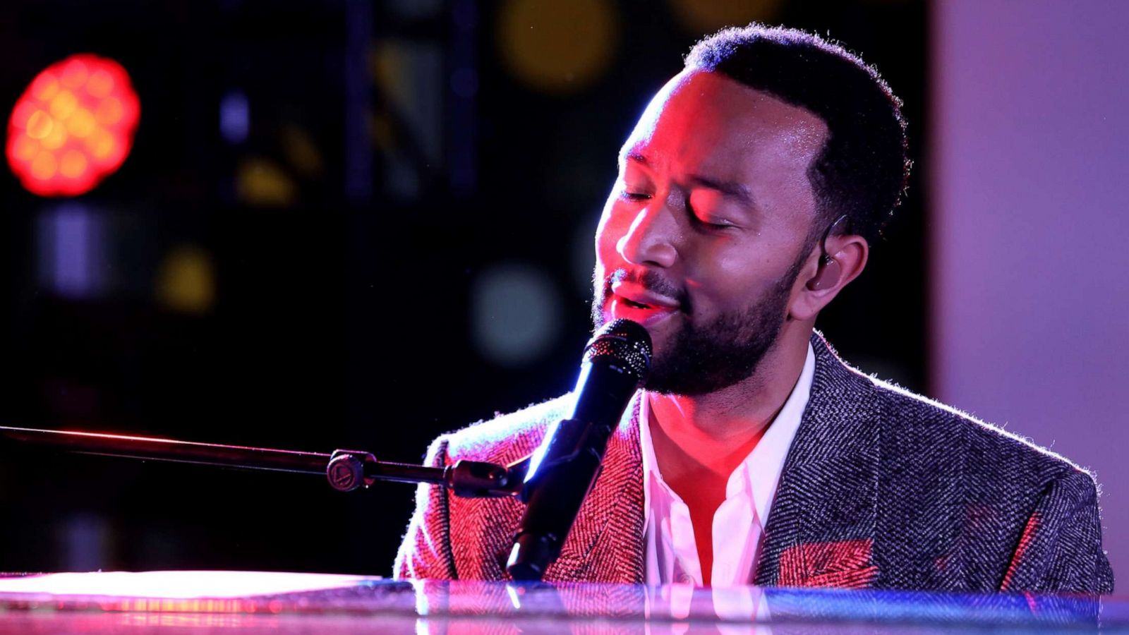 PHOTO: John Legend performs onstage as Nordstrom celebrates a legendary holiday with John Legend and Sperry at the Nordstrom NYC Flagship, on Dec. 3, 2021 in New York City.