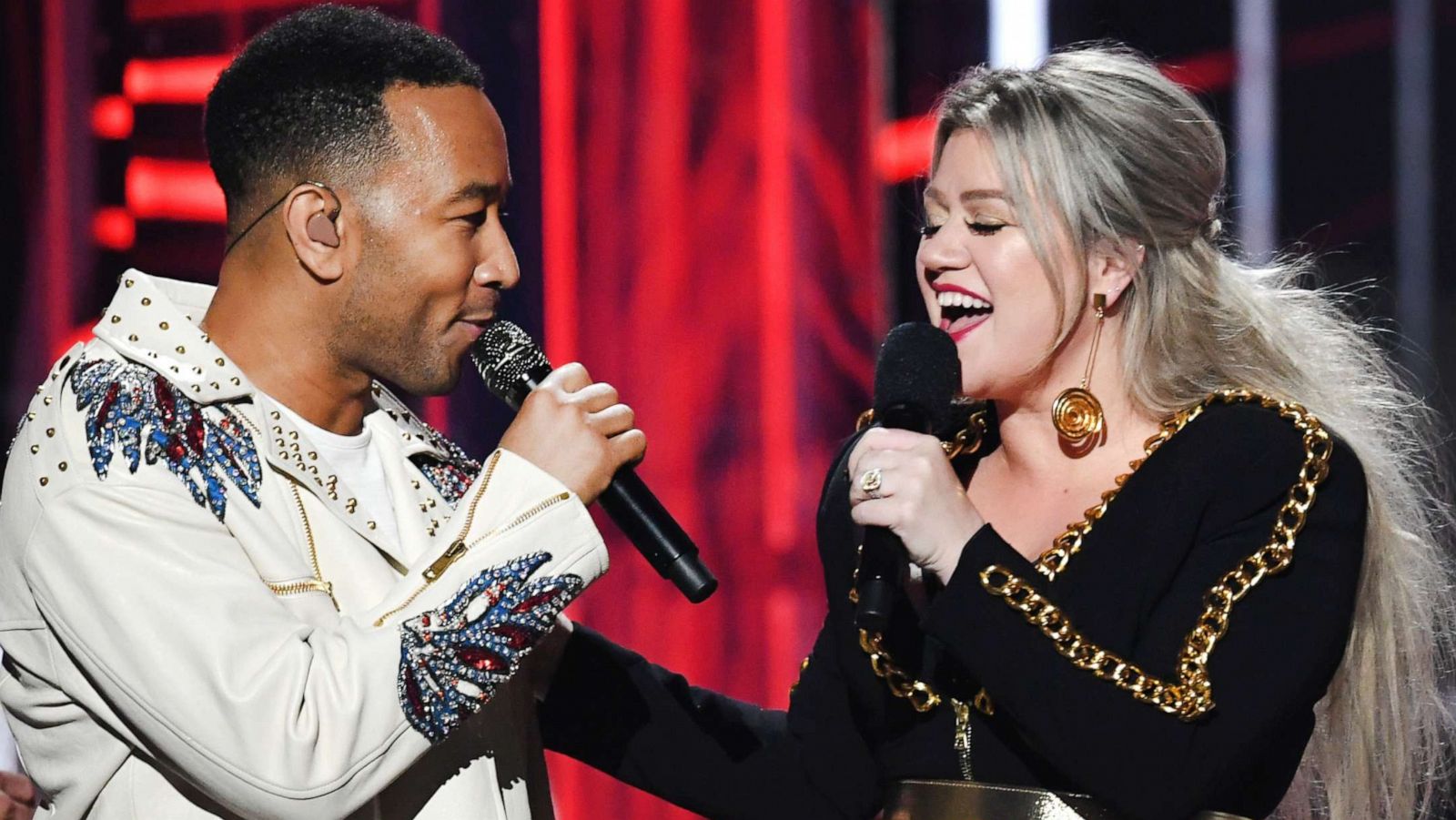 PHOTO: Recording artist John Legend, left, and Kelly Clarkson onstage during an event in Las Vegas, May 20, 2018.