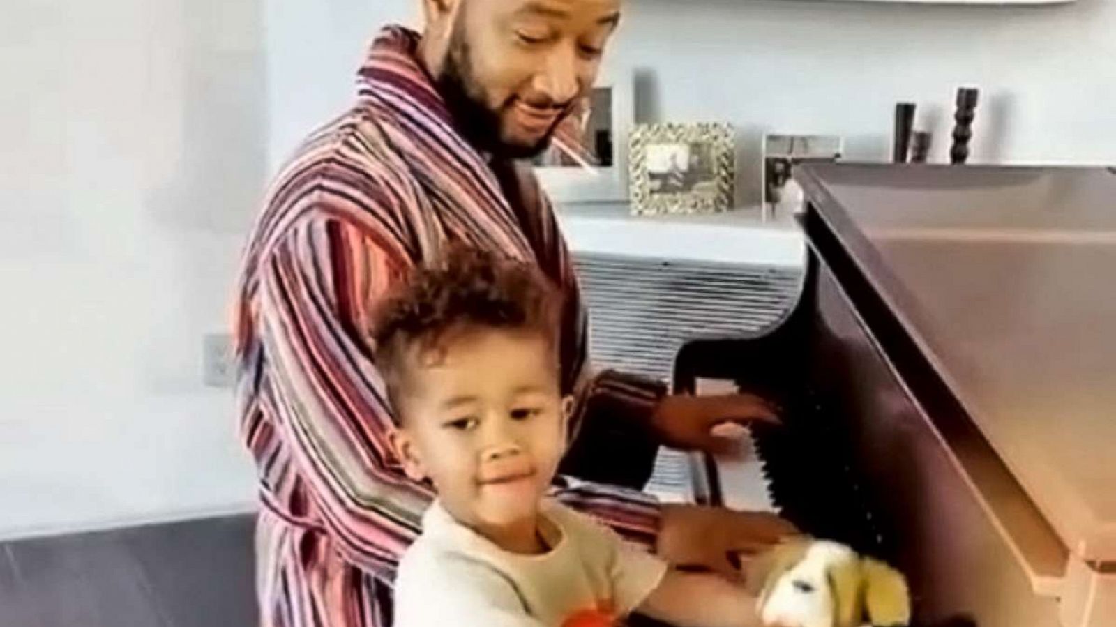 PHOTO: John Legend plays the piano accompanied by his son Miles in an image Chrissy Teigen posted to her Instagram account.