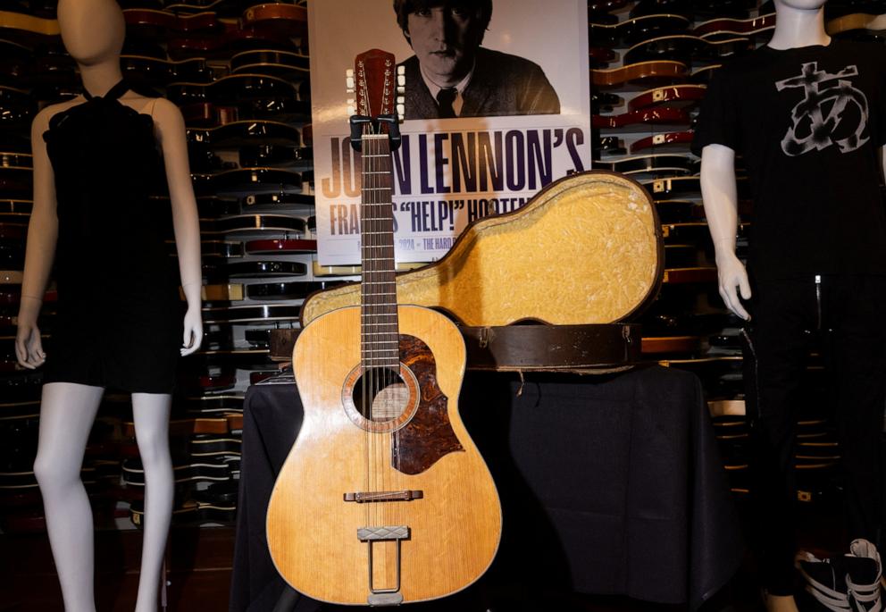 PHOTO: The Framus "Help!" Hootenanny Guitar presumed lost for 50 years that belonged to John Lennon is displayed during the Julien's Music Icons Auction preview at Hard Rock Cafe, May 21, 2024, in New York.