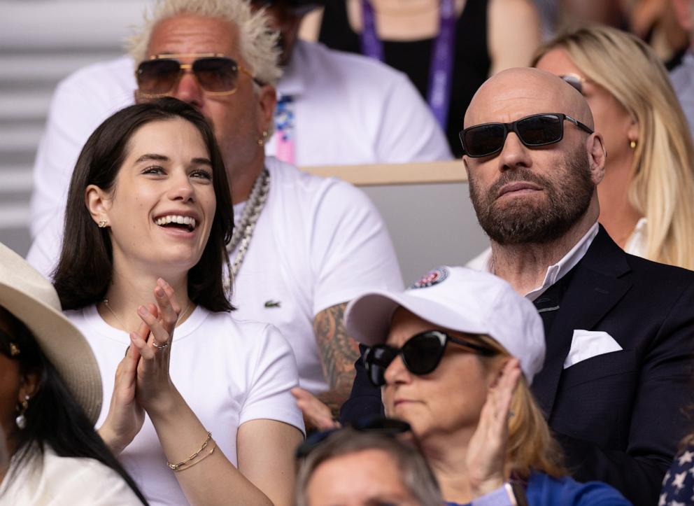 PHOTO: Ella Bleu Travolta and John Travolta attend the Men's Singles Gold medal match between Carlos Alcaraz of Team Spain and Novak Djokovic of Team Serbia on day nine of the Olympic Games Paris 2024 at Roland Garros August 04, 2024 in Paris, France.