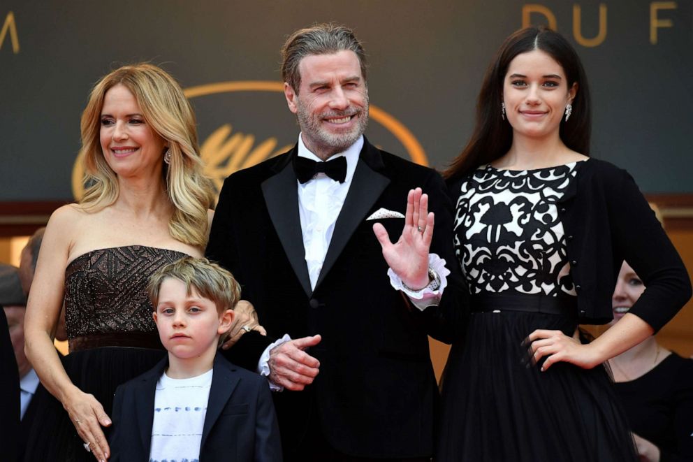 PHOTO: Actor John Travolta, his wife Kelly Preston and their children Ella Bleu Travolta and Benjamin Travolta pose as they arrive on May 15, 2018, for the screening of the film "Solo: A Star Wars Story," at the Cannes Film Festival in Cannes, France.