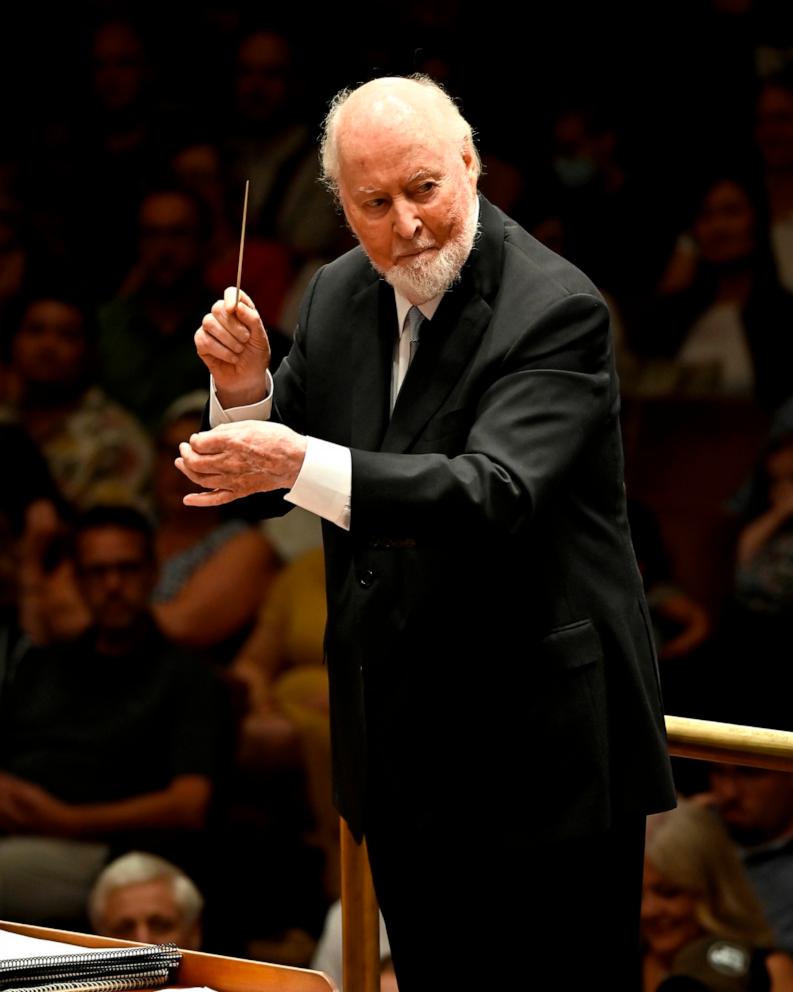 PHOTO: In this July 16, 2023, file photo, composer John Williams conducts a concert at the Kennedy Center Concert Hall, in Washington, D.C.
