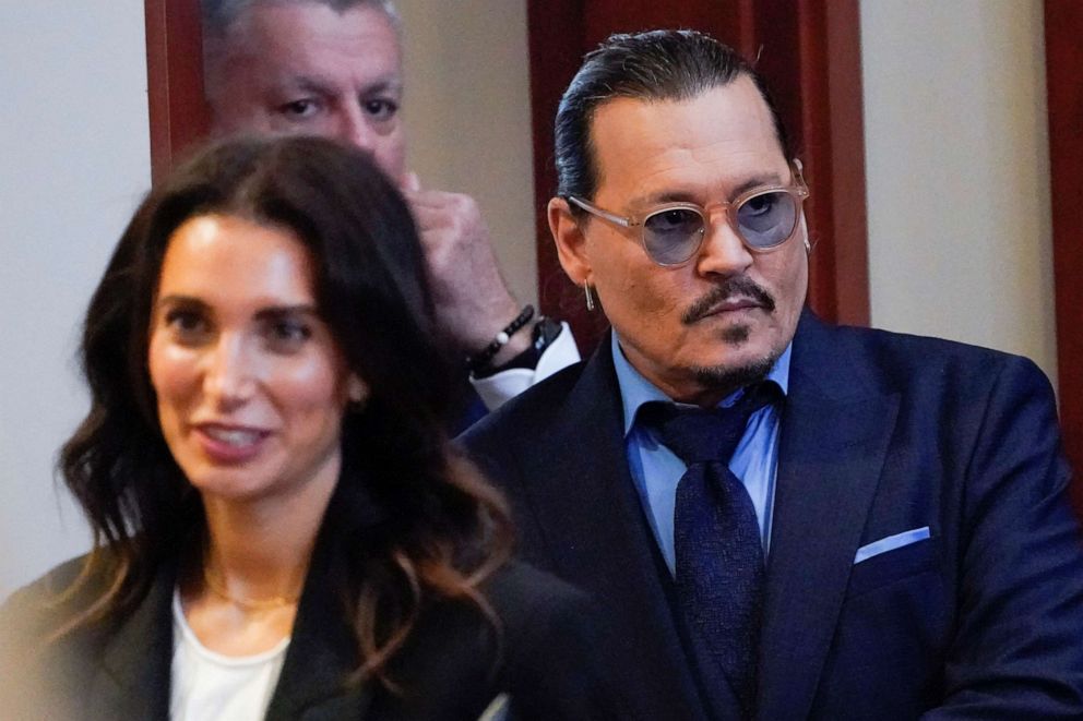 PHOTO: Actor Johnny Depp arrives in the courtroom for closing arguments in his defamation case against his ex-wife Amber Heard, at the Fairfax County Circuit Courthouse in Fairfax, Virginia, May 27, 2022.