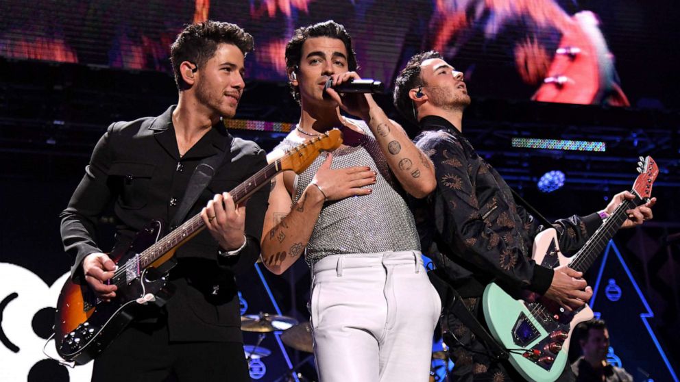 PHOTO: Nick Jonas, Joe Jonas, and Kevin Jonas of the Jonas Brothers perform onstage during iHeartRadio Z100 Jingle Ball 2021, on Dec. 10, 2021 in New York City.
