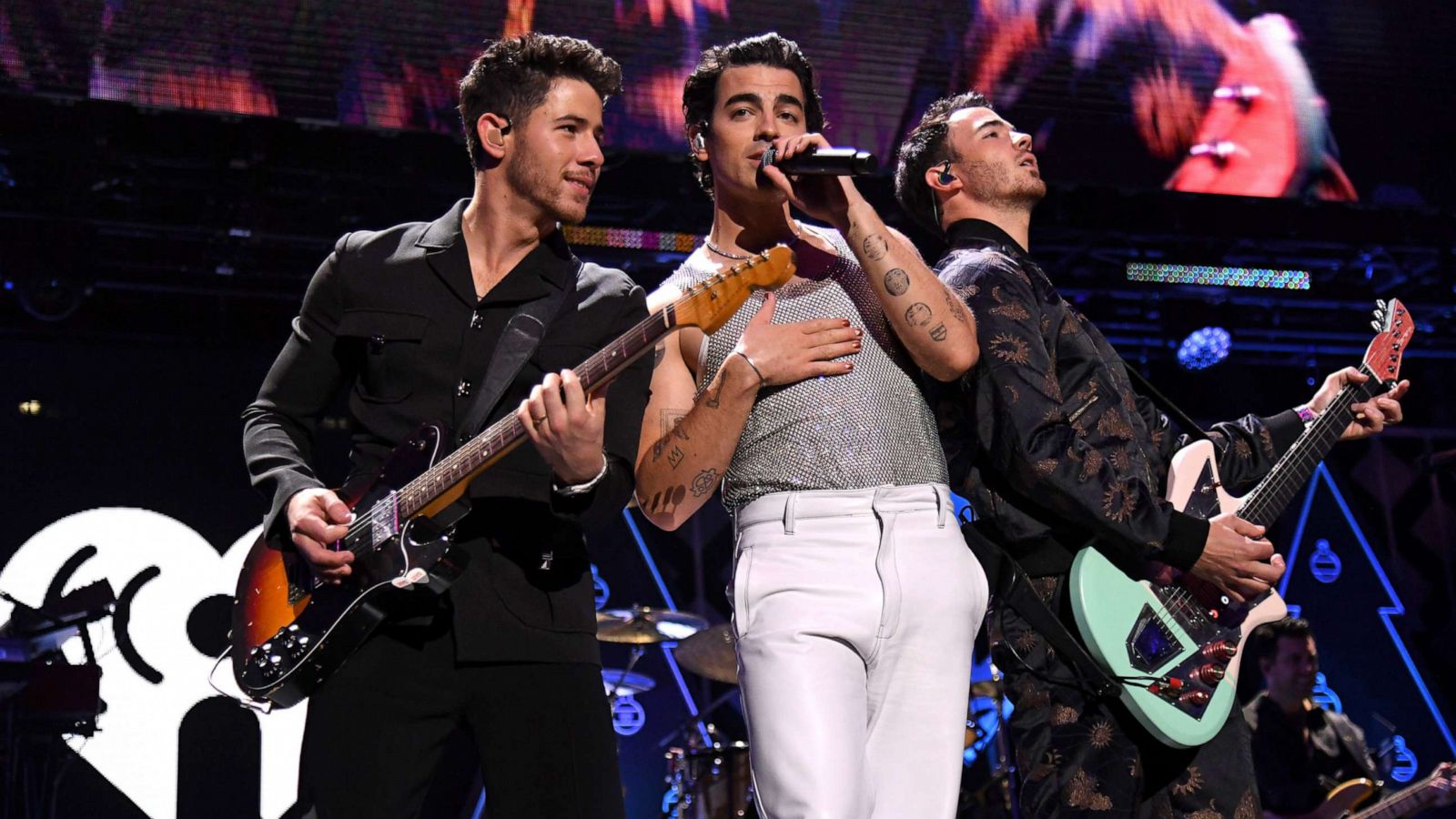 PHOTO: Nick Jonas, Joe Jonas, and Kevin Jonas of the Jonas Brothers perform onstage during iHeartRadio Z100 Jingle Ball 2021, on Dec. 10, 2021 in New York City.