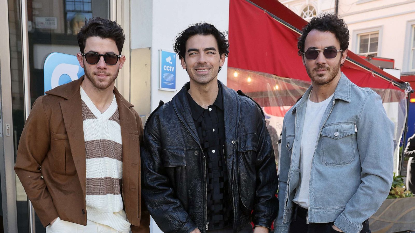 PHOTO: Nick Jonas, Joe Jonas and Kevin Jonas from the 'Jonas Brothers' arriving at Global Radio Studios to promote their new single 'Waffle House,' April 11, 2023, in London.