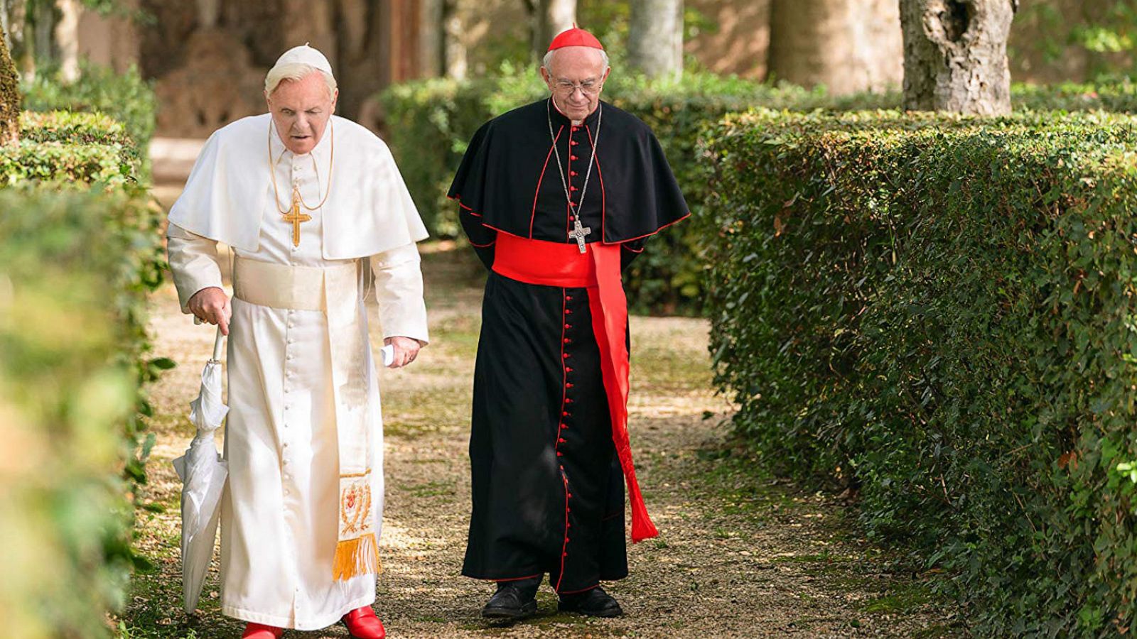 PHOTO: Anthony Hopkins and Jonathan Pryce in a scene from "The Two Popes."